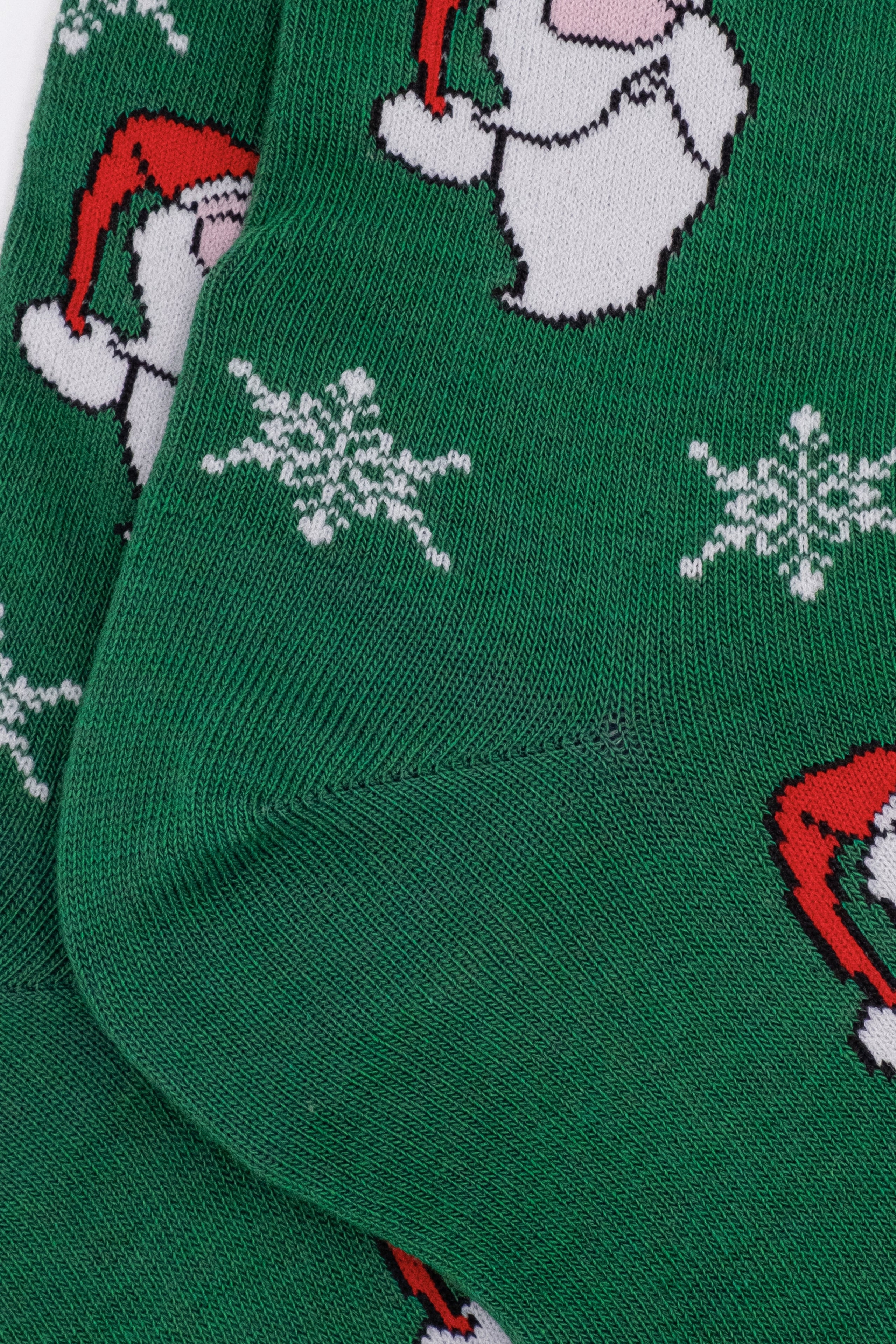 Lange Socken mit Weihnachtsmuster - Dunkelgrün